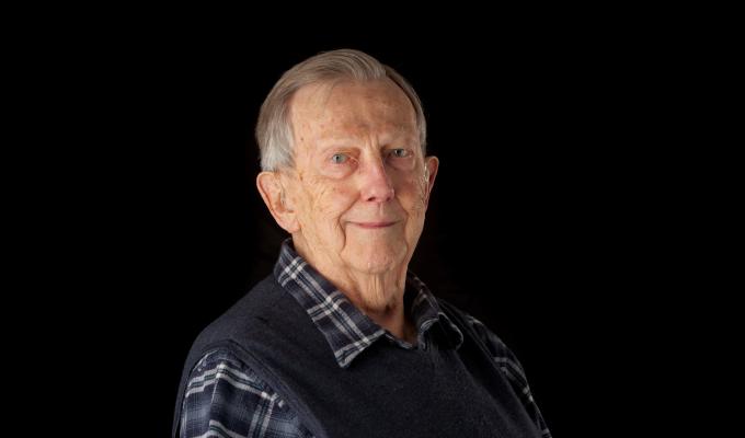 Ken Hedberg in front of black backdrop