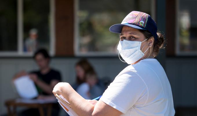 TRACE staff member wearing mask on job site