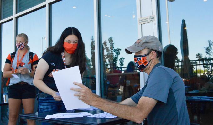 TRACE field staff analyzing documents at TRACE testing site.