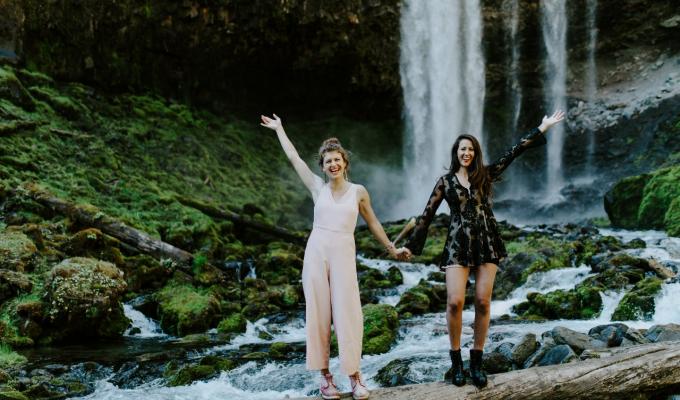 Heather Masson-Forsythe with her sister, Margaux, at a waterfall