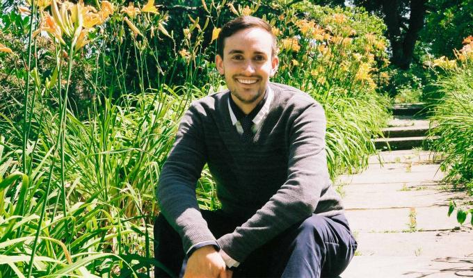 Bryan Lynn sitting outside