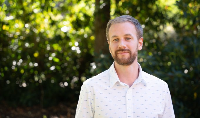 Jonathan Gallion smiles and celebrates his 2024 Early Career Award.