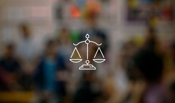 Scales in front of blurred background.