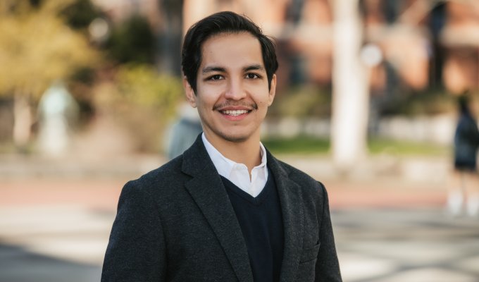 A man poses for a headshot