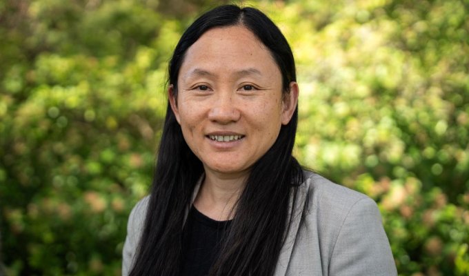 Headshot of Lan Xue outside Kidder Hall
