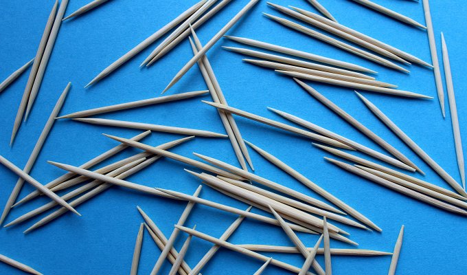 Toothpicks scattered on a table