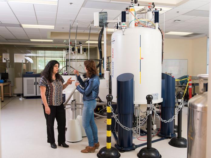 Elisar Barbar and student in the Nuclear Magnetic Resonance Facility.
