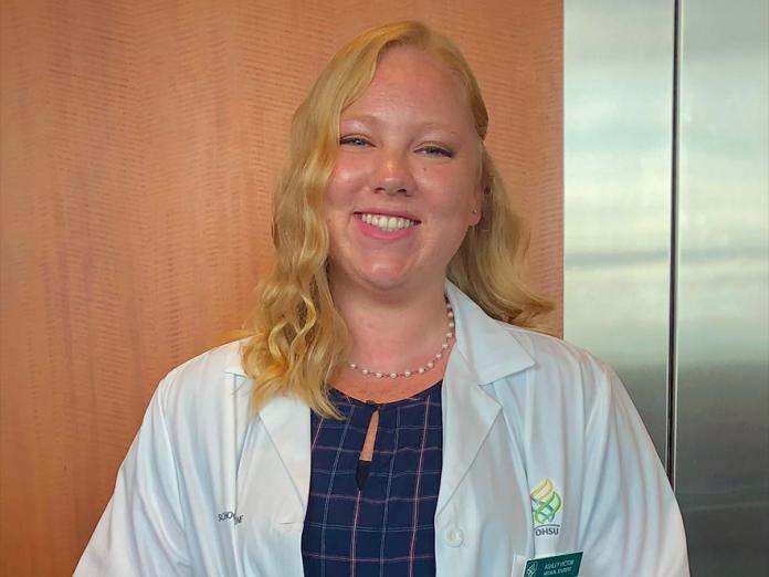 Ashley Victor, a blonde woman in a white lab coat.