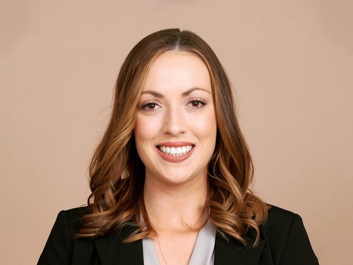 Jaime Scott, a woman with medium length brown hair.