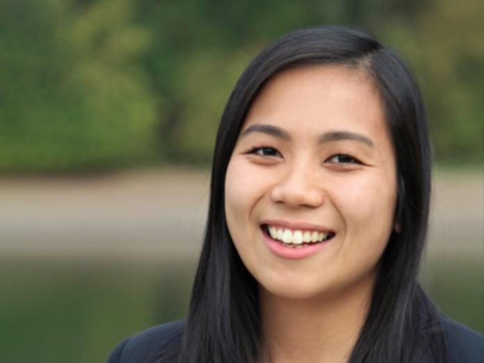 Michelle Nguyen, a woman with long dark hair.