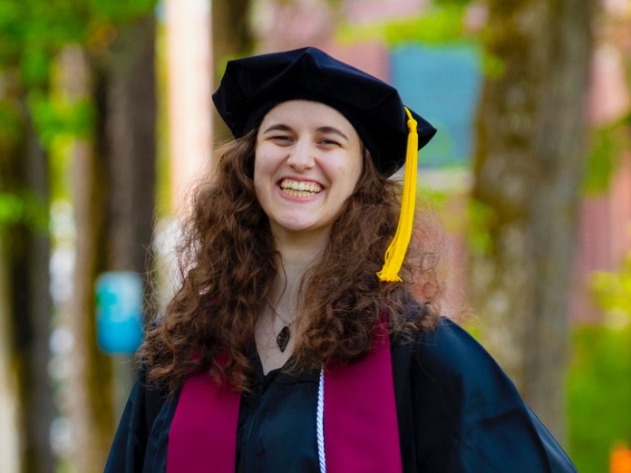 Abbie Glickman wearing graduation cap
