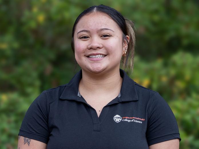 Smiling headshot of Lauren