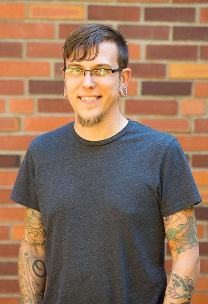 David Hubert in front of bricks