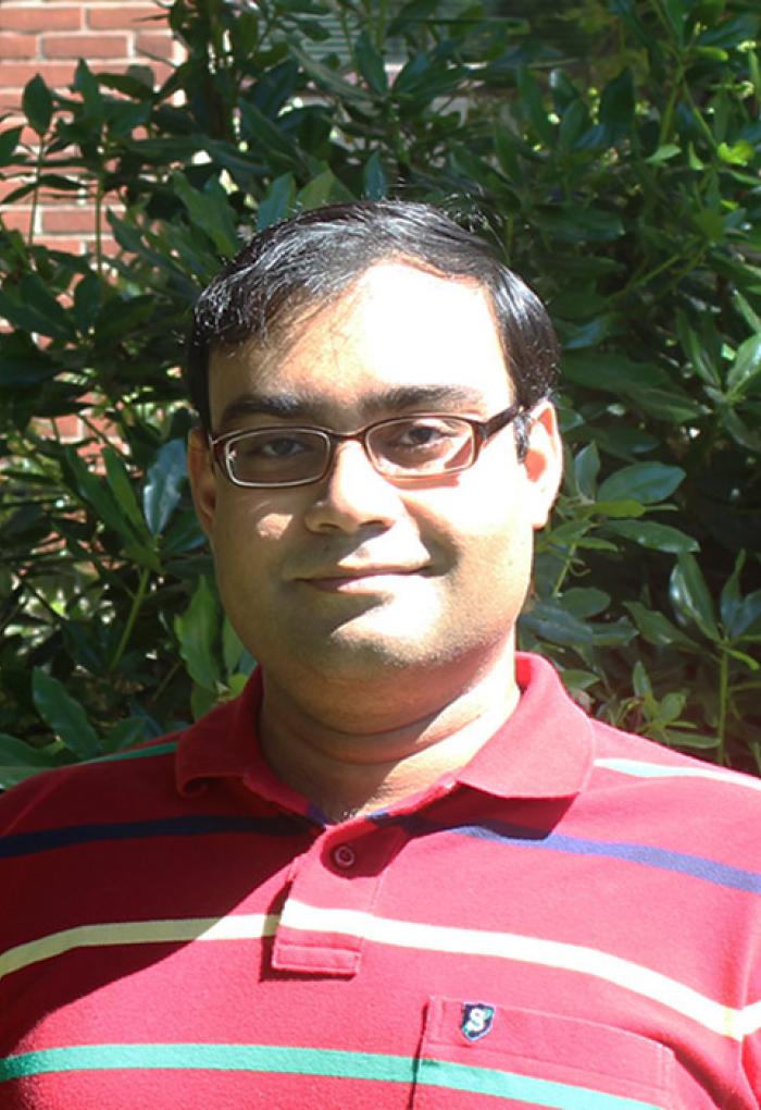 Sharmodeep Bhattacharyya standing in front of Kidder Hall