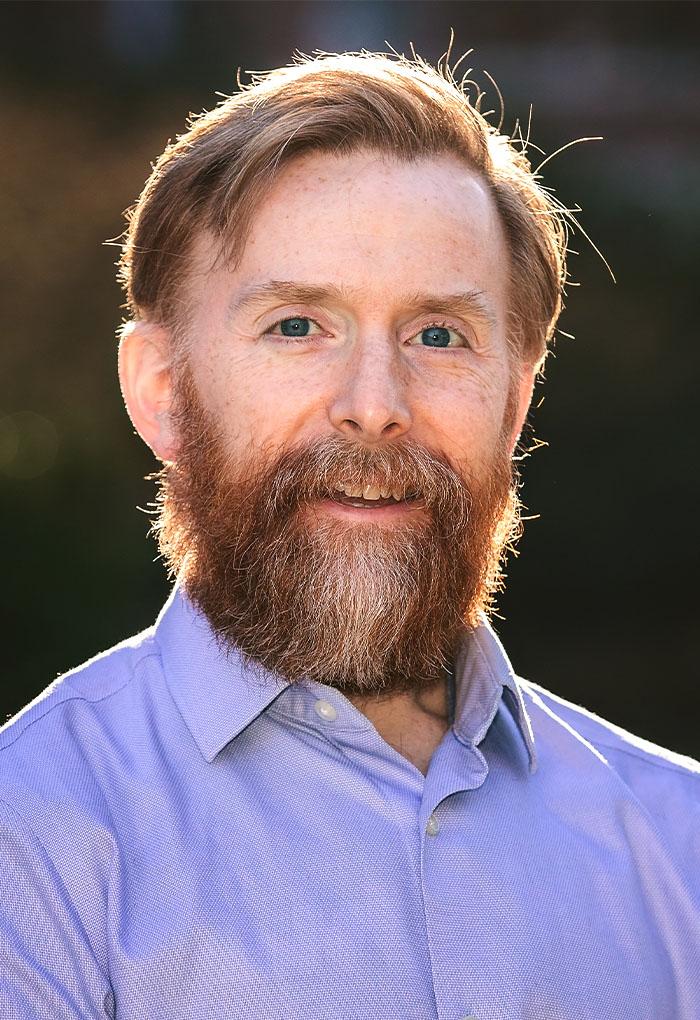 Colin Johnson, a man with a red beard.