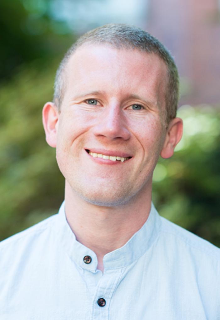 Cody Duncan smiling for a photo.