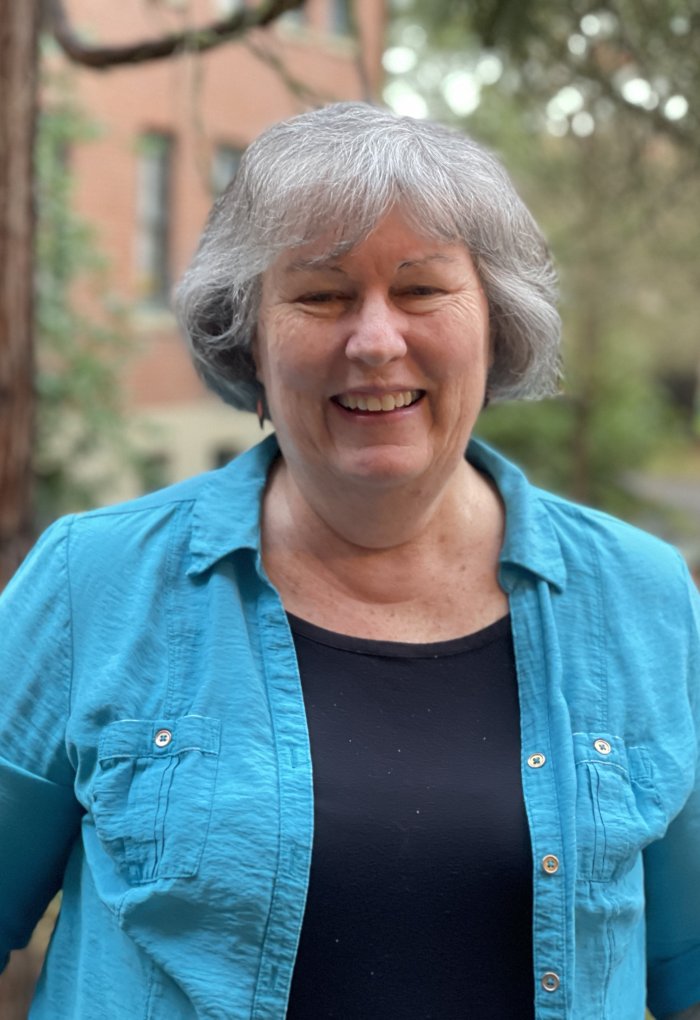 Headshot of Margie Haak in blue top.