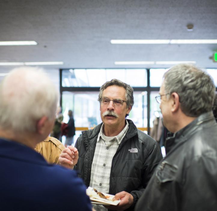 male colleagues chatting in lobby