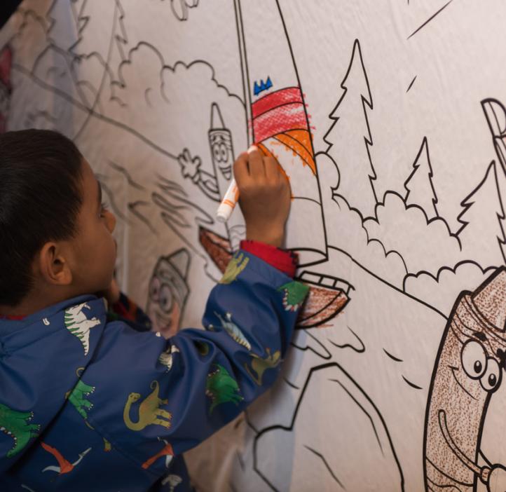 children coloring Crayola paper banner of crayon cartoons hiking
