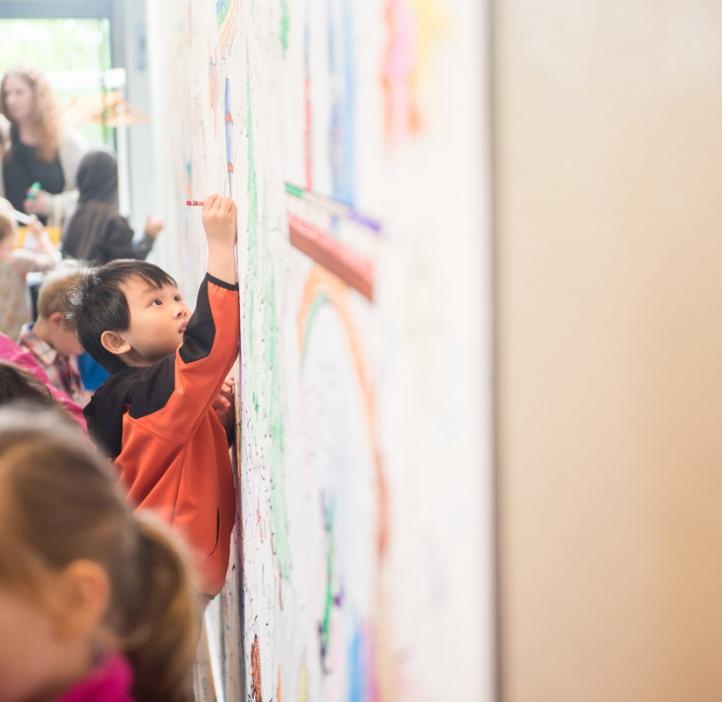 children coloring on banner