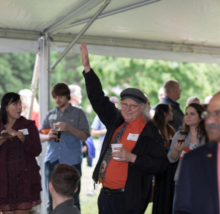 Kevin Ahern noticing camera from crowd