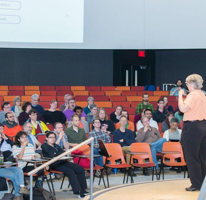 Corinne Manogue speaking to audience