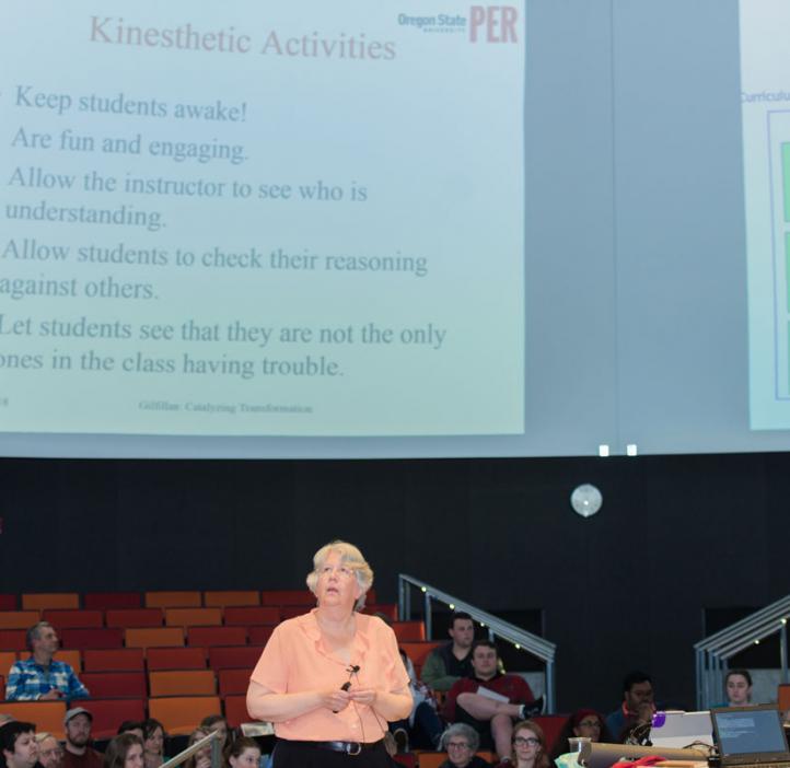 Corinne Manogue presenting slideshow