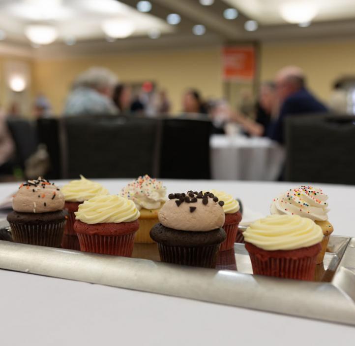 cupcakes sitting in center of table