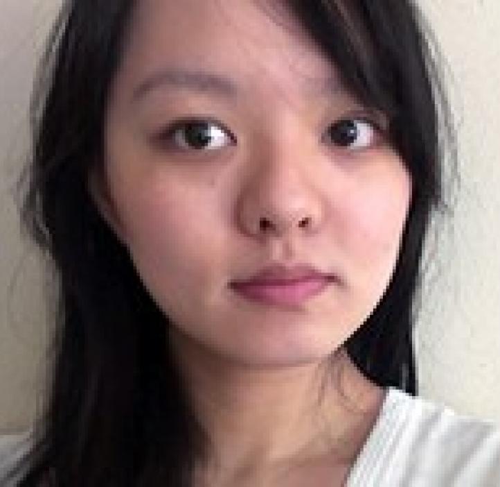 Michelle Tan in front of white backdrop