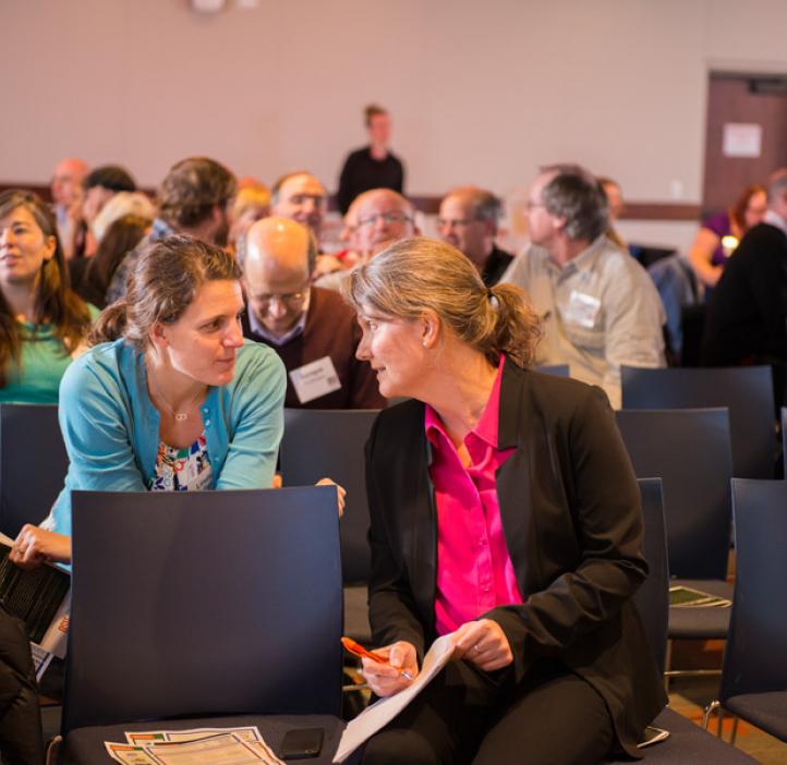 Awards ceremony attendees work together on a problem posed by guest presenters ESTEME