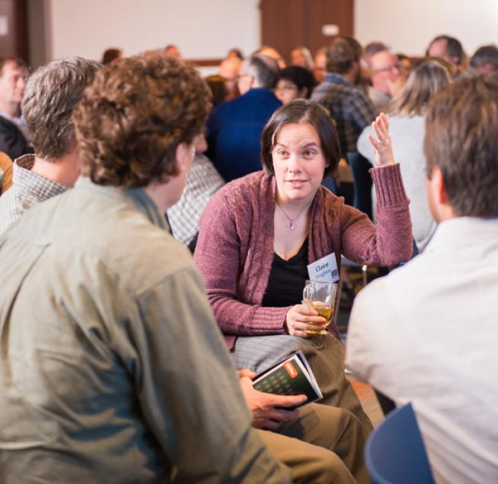 Awards ceremony attendees work together on a problem posed by guest presenters ESTEME
