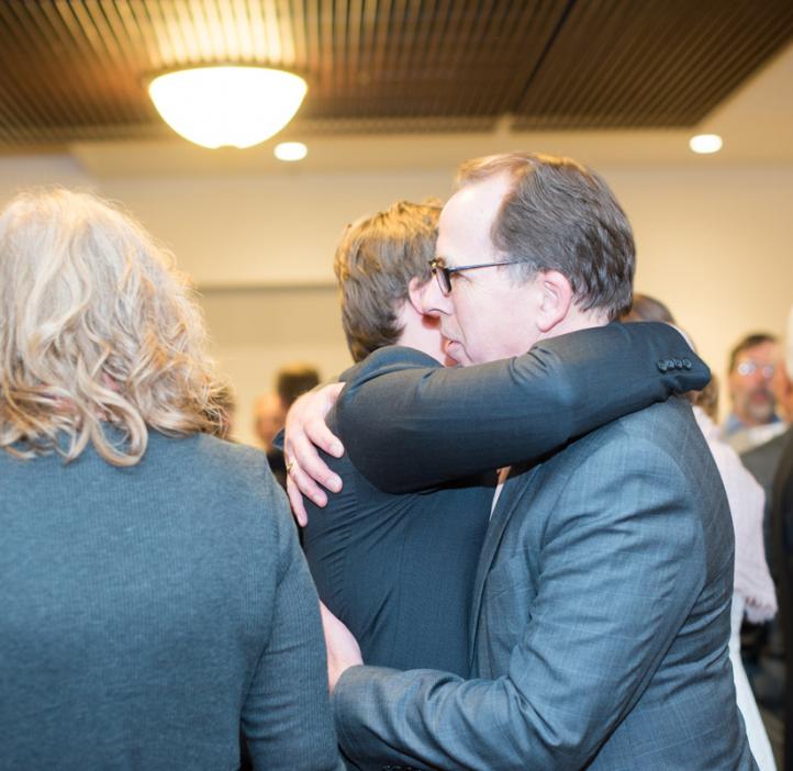 Scott Clark hugging male