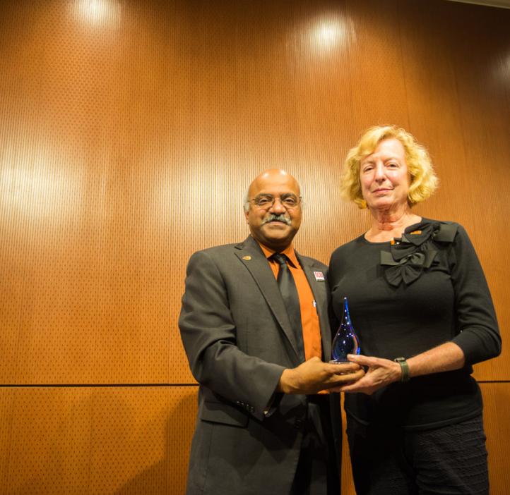 Gretchen Schuette receiving award from Sastry Pantula