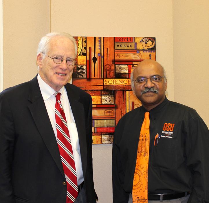 William Kirwan and Sastry Pantula standing in office space
