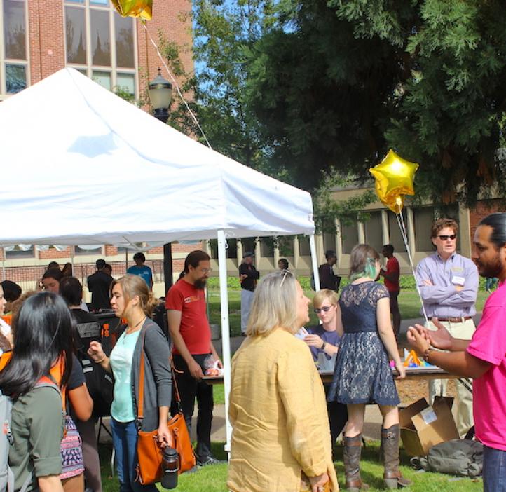 college of science community walking around booths