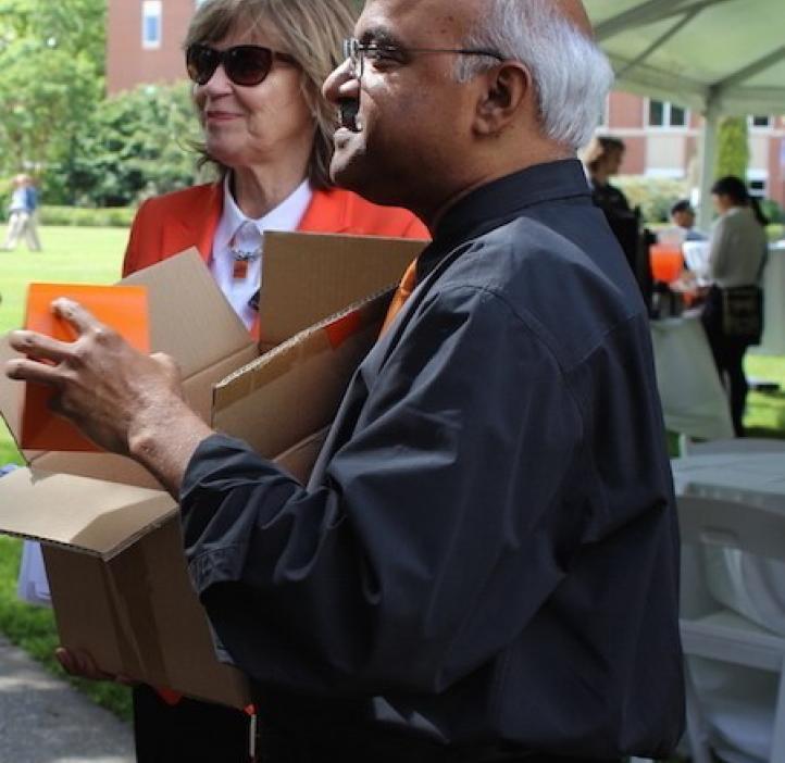 Sastry Pantula and Kathy Bickel talking with colleagues