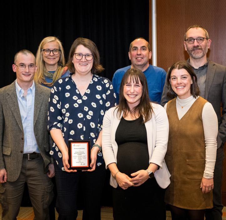 The College of Science Mentoring Community smiles for a photo at the 2024 Winter Awards Ceremony at Oregon State University.