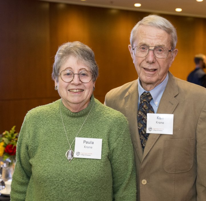 People pose for photo at Alumni Award dinner.