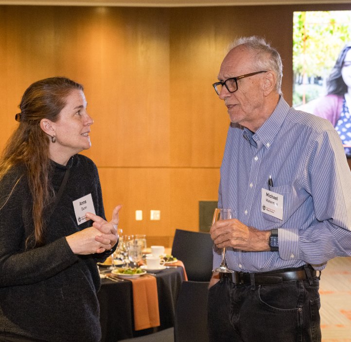 People pose for photo at Alumni Award dinner.