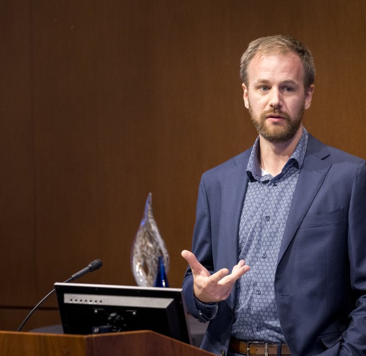 People pose for photo at Alumni Award dinner.
