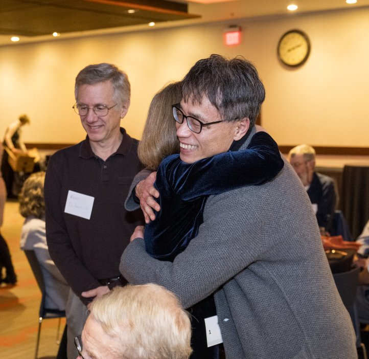 People pose for photo at Alumni Award dinner.