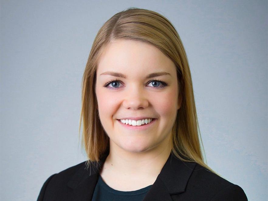 Shan Lansing, a woman with long blonde hair, smiling.