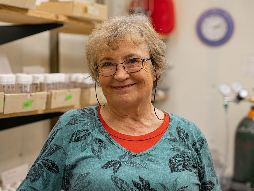 Photoshot of Jaga Giebultowicz smiling in her lab